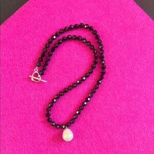 Super pretty black beaded necklace with simulated pearl drop